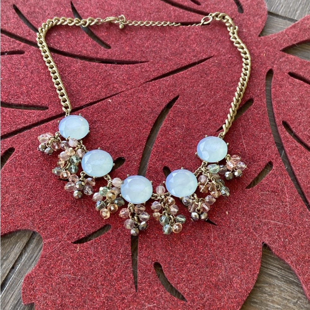 Elegant Gold and Pale Blue Beaded Necklace